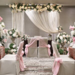 Intimate indoor solemnization setup at Novotel Hotel Singapore, with luxurious seating and delicate floral arrangements.