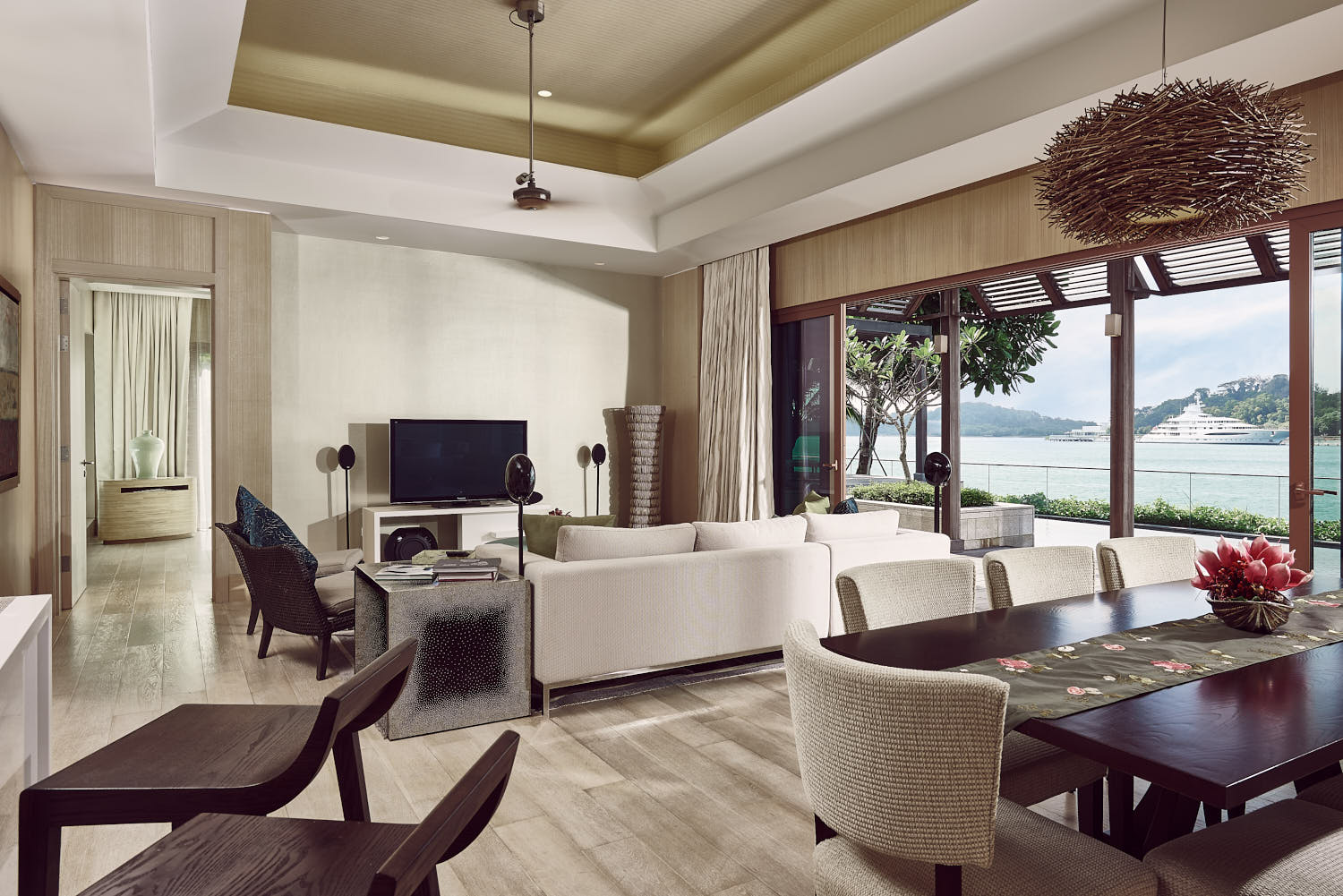 Equarius Villas at RWS with private terrace, offering stunning views of the turquoise sea.