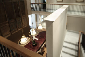 Capella Hotel villa-style room with private terrace, luxury furnishings, and tropical garden views.