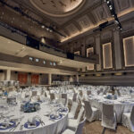 Capitol Theatre Singapore dinner table setup with grand tablescapes, elegant lighting, and intricate details.