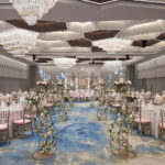 Pan Pacific Hotel indoor wedding celebration with high ceilings, grand floral displays, and refined decor.