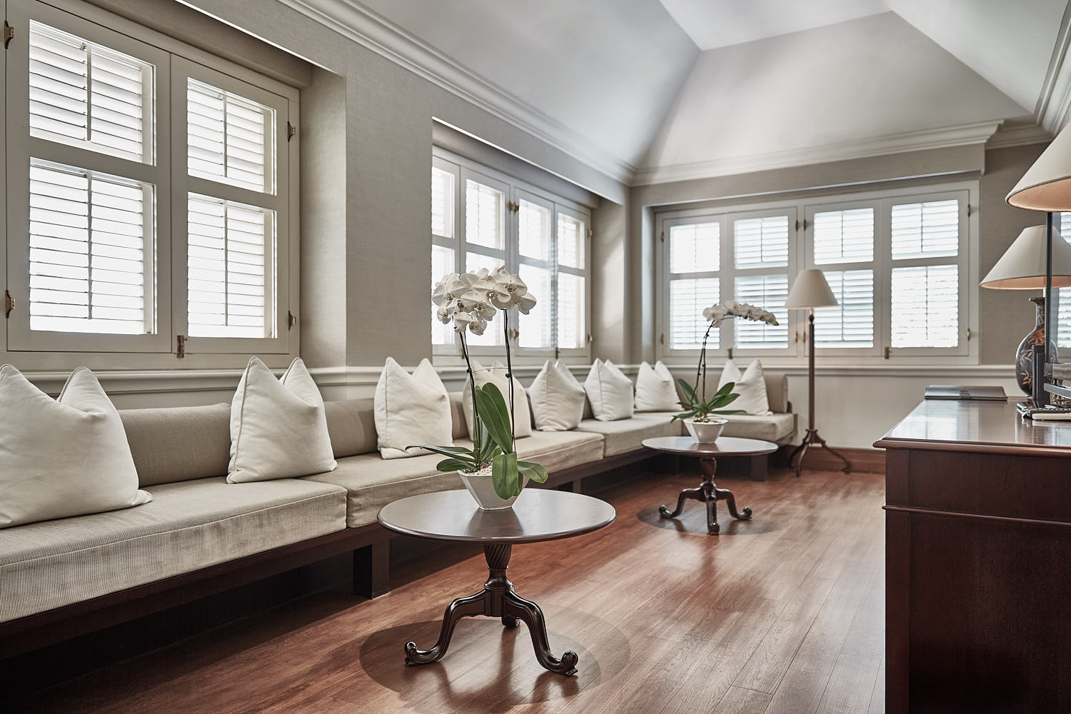 Luxury villa suite with vaulted ceilings, stylish interiors, and secluded garden access.