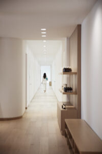 Luxurious spa at Como Singapore, offering tranquil ambiance with soft lighting and natural elements.