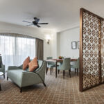 Spacious family room at Rendezvous Orchard with comfortable seating and a cozy atmosphere.