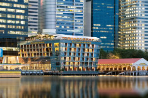 The Fullerton Bay Hotel’s striking waterfront architecture, blending modern design with serene water views.