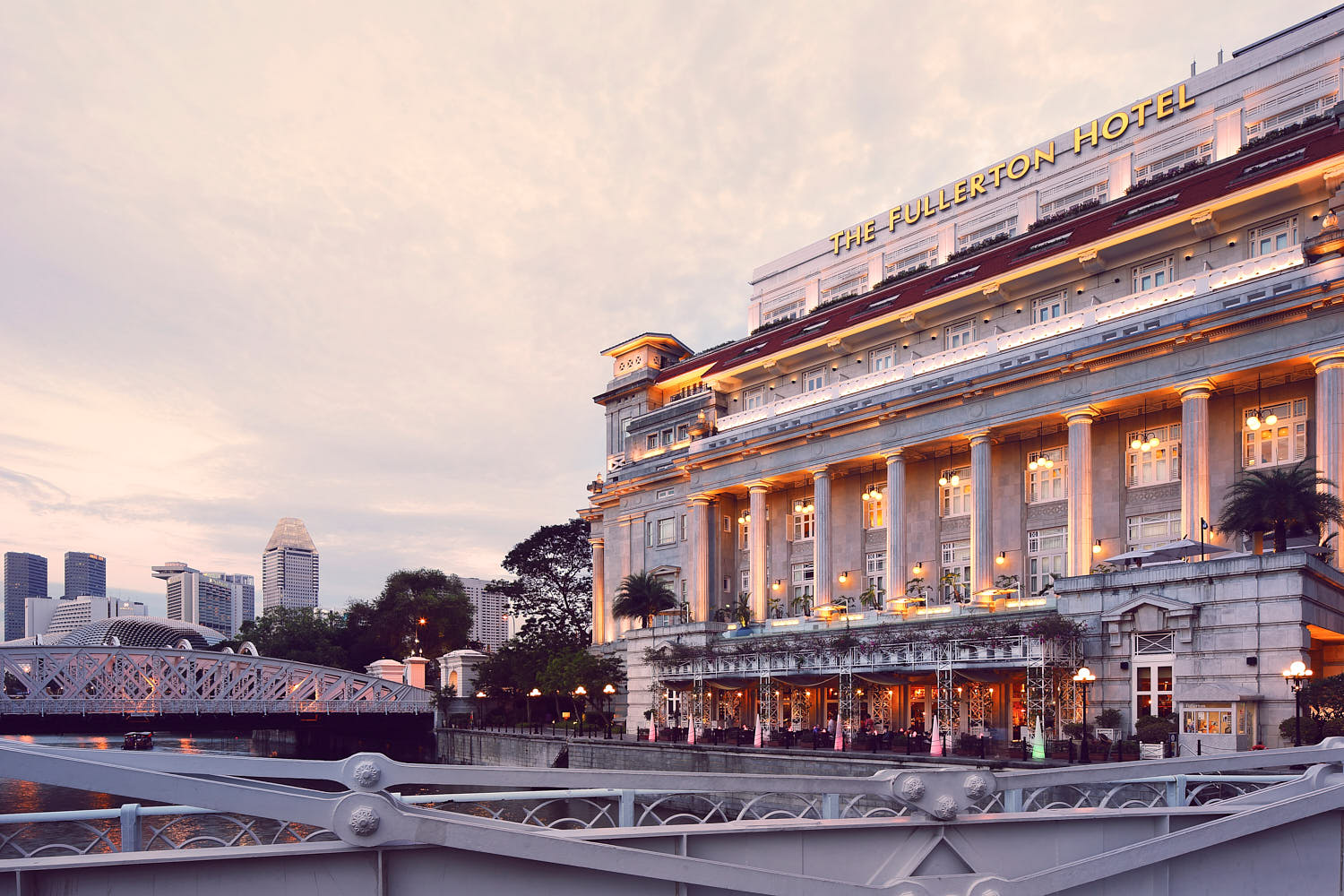 Elegant waterfront facade of The Fullerton, offering a seamless connection between colonial architecture and modern city.