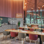 Chic dining space at Oasia Downtown Hotel with a warm, inviting atmosphere.