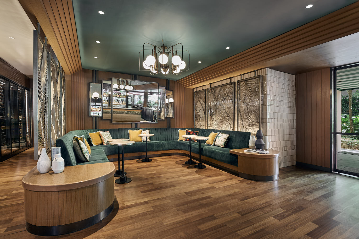 InterContinental Hotel’s Publico stylish lounge with warm lighting and premium spirits.