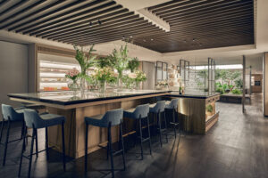Hilton Hotel wedding reception with long banquet tables, floral centerpieces, and soft ambient lighting.