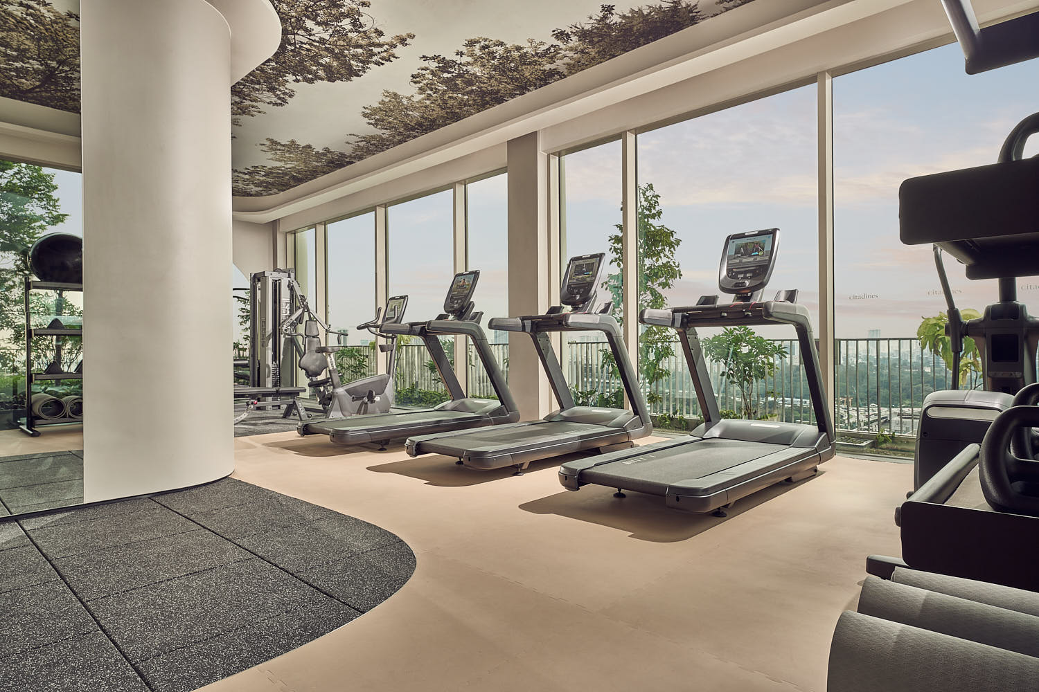 Spacious and well-lit fitness center at Citadines Singapore, perfect for a complete workout.
