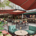 Elegant alfresco dining area at InterContinental Hotel with modern decor.