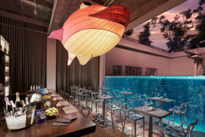 Fish Pool at JW Marriott Singapore offers sashimi, crudo, and ceviche by an Olympic diving pool.