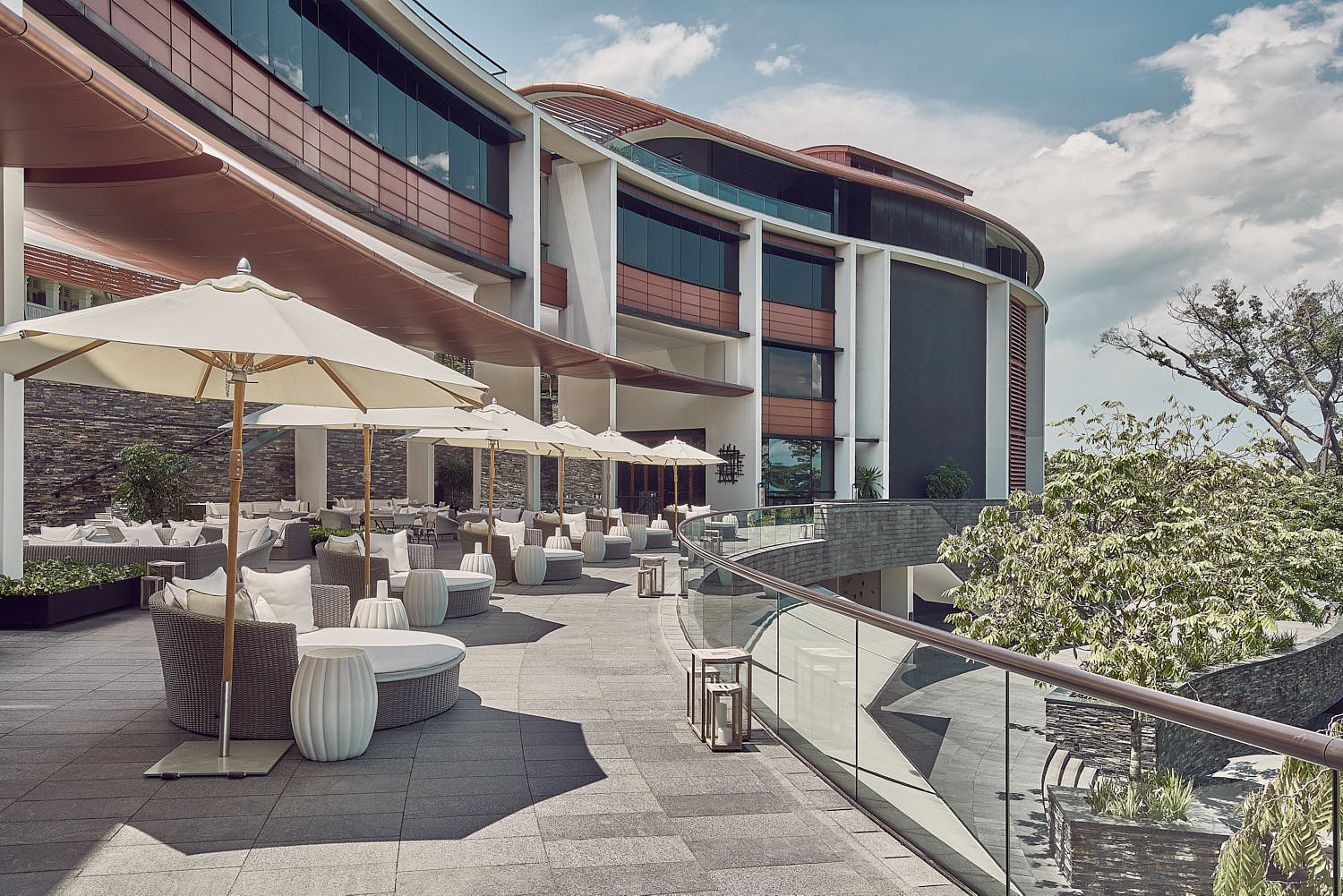 Capella Hotel Singapore's open-air pavilion overlooking the sea.