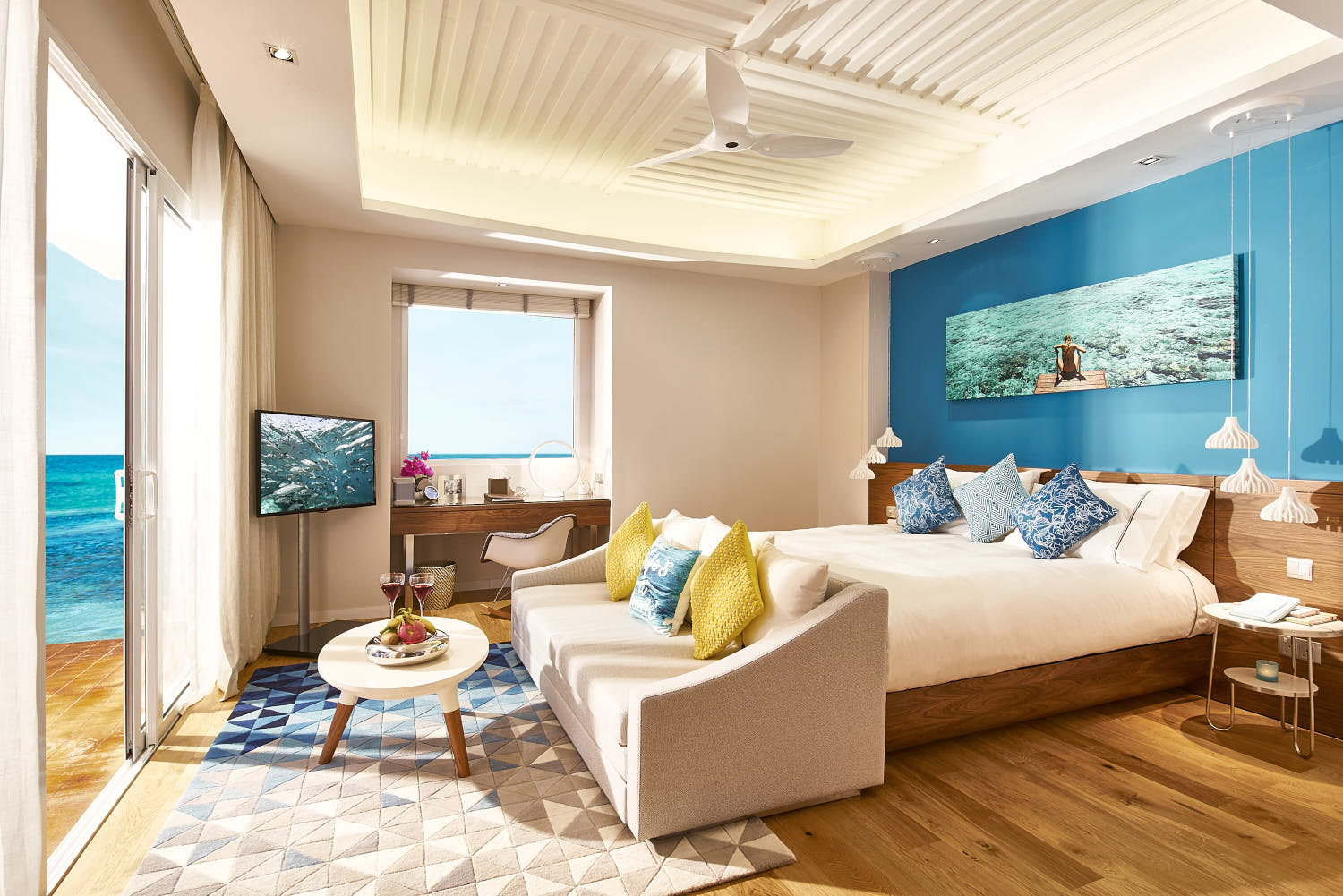 Elegant beachside villa with a panoramic view of the ocean at Kandima Maldives, offering a private retreat with modern decor.