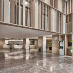 Inviting hotel lobby at Novotel, featuring contemporary design and comfortable seating.