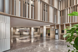 Inviting hotel lobby at Novotel, featuring contemporary design and comfortable seating.