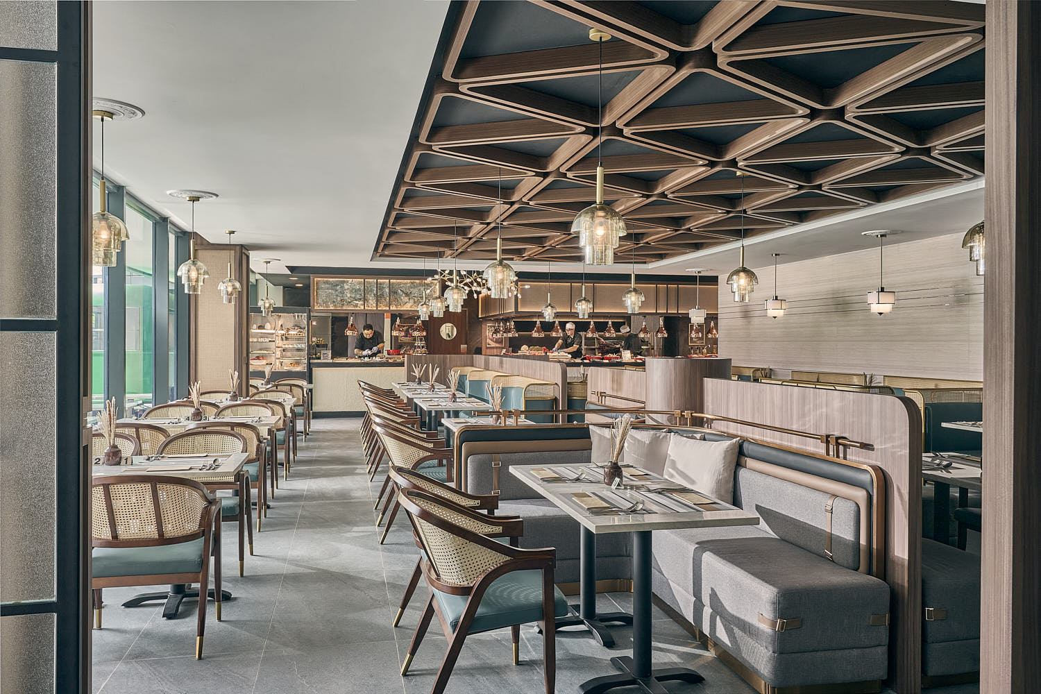 Mercure hotel indoor dining area featuring contemporary furnishings and a warm ambiance.