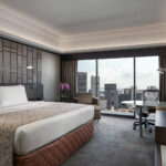 Stylish hotel room at Pan Pacific Hotel Singapore with mood lighting and a peaceful, serene ambiance.
