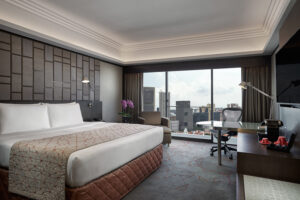 Stylish hotel room at Pan Pacific Hotel Singapore with mood lighting and a peaceful, serene ambiance.