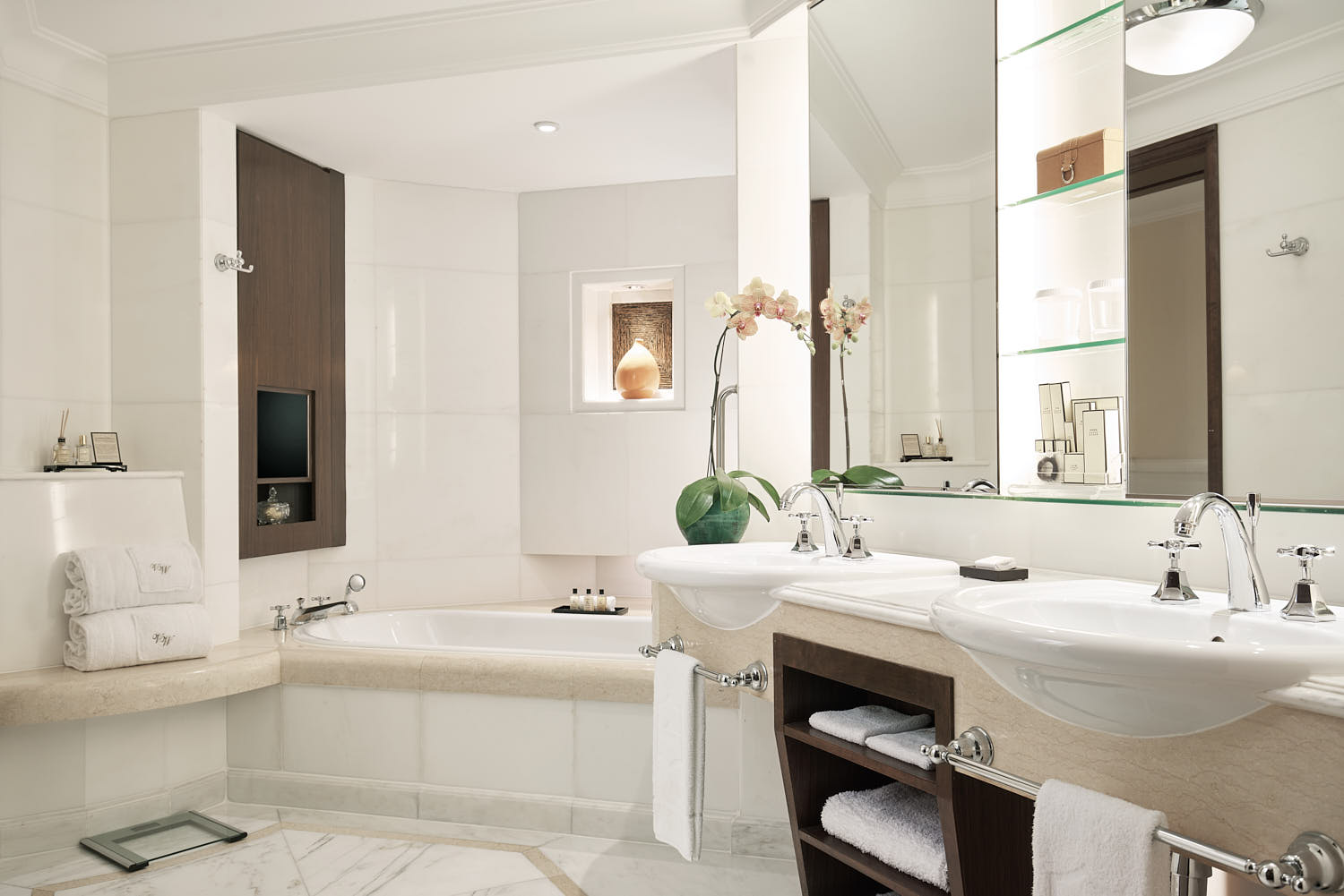 Luxurious bathroom retreat at Shangri La Hotel, featuring intricate tile work, premium fixtures, and a soothing atmosphere.