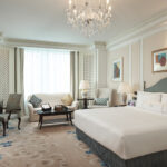 Luxurious room interior at Shangri La Hotel, showcasing a blend of modern comfort and classic elegance.