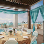 Intimate wedding solemnization at Oasia Hotel with stylish chairs, delicate floral arrangements, and natural lighting.