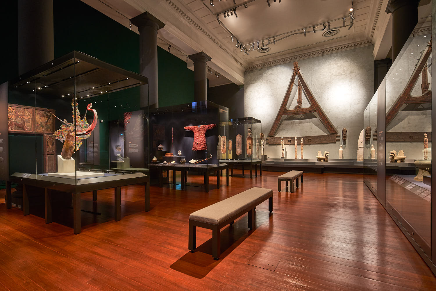 Textile and garment exhibition featuring traditional Asian fabrics.