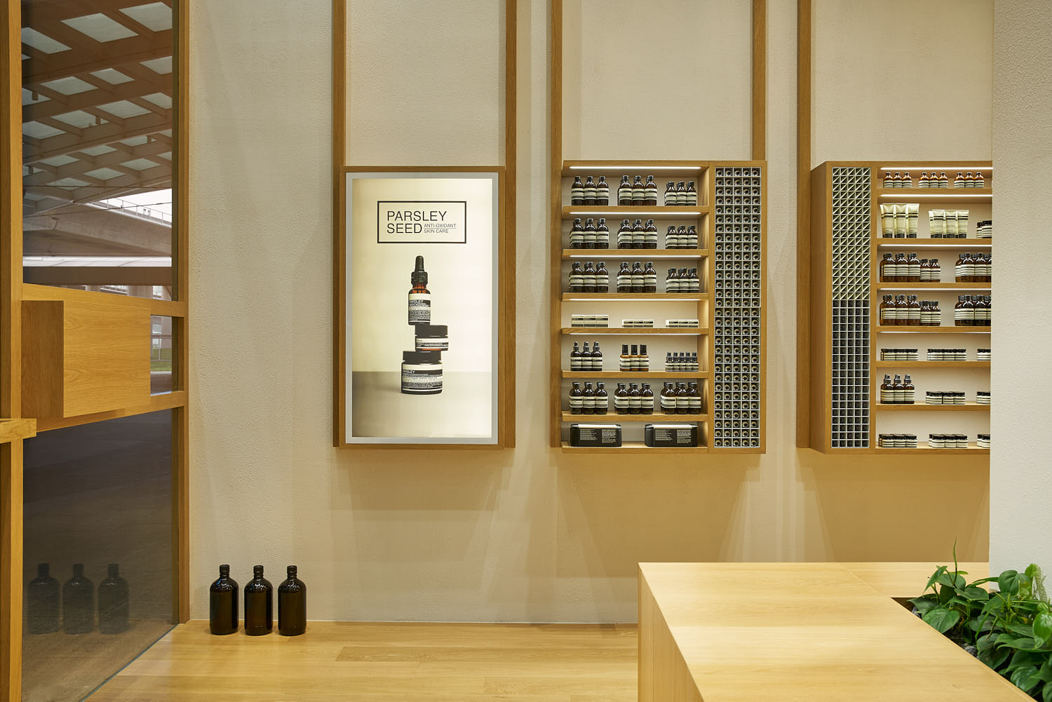 Close-up of wood texture used in Aesop’s contemporary retail design.