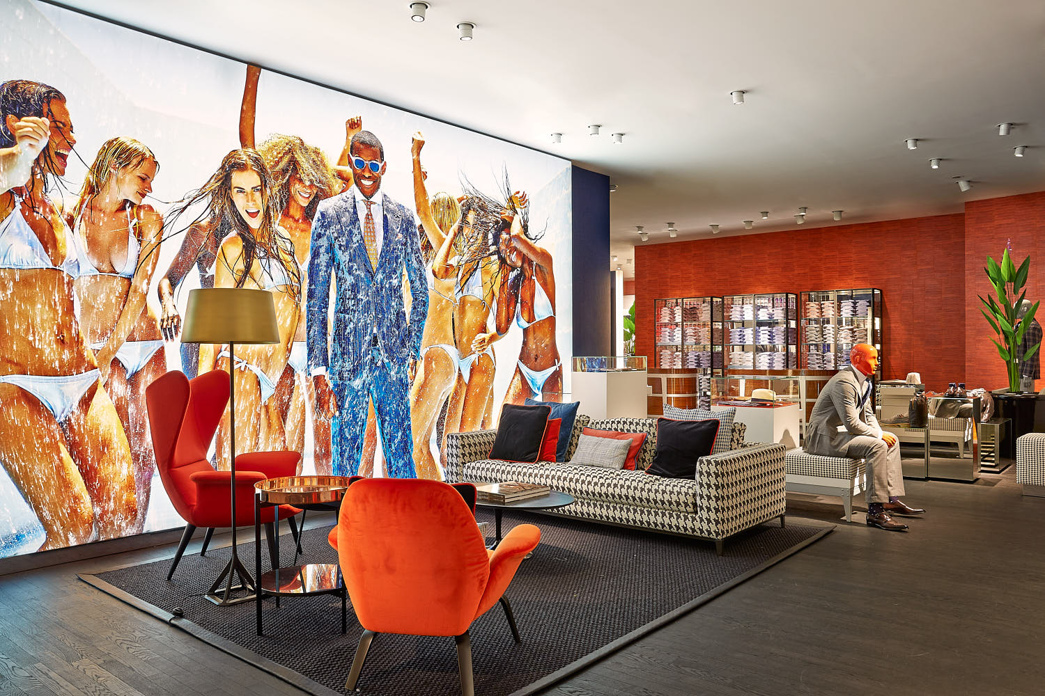 Contemporary retail design for a men’s suit boutique with pops of color.