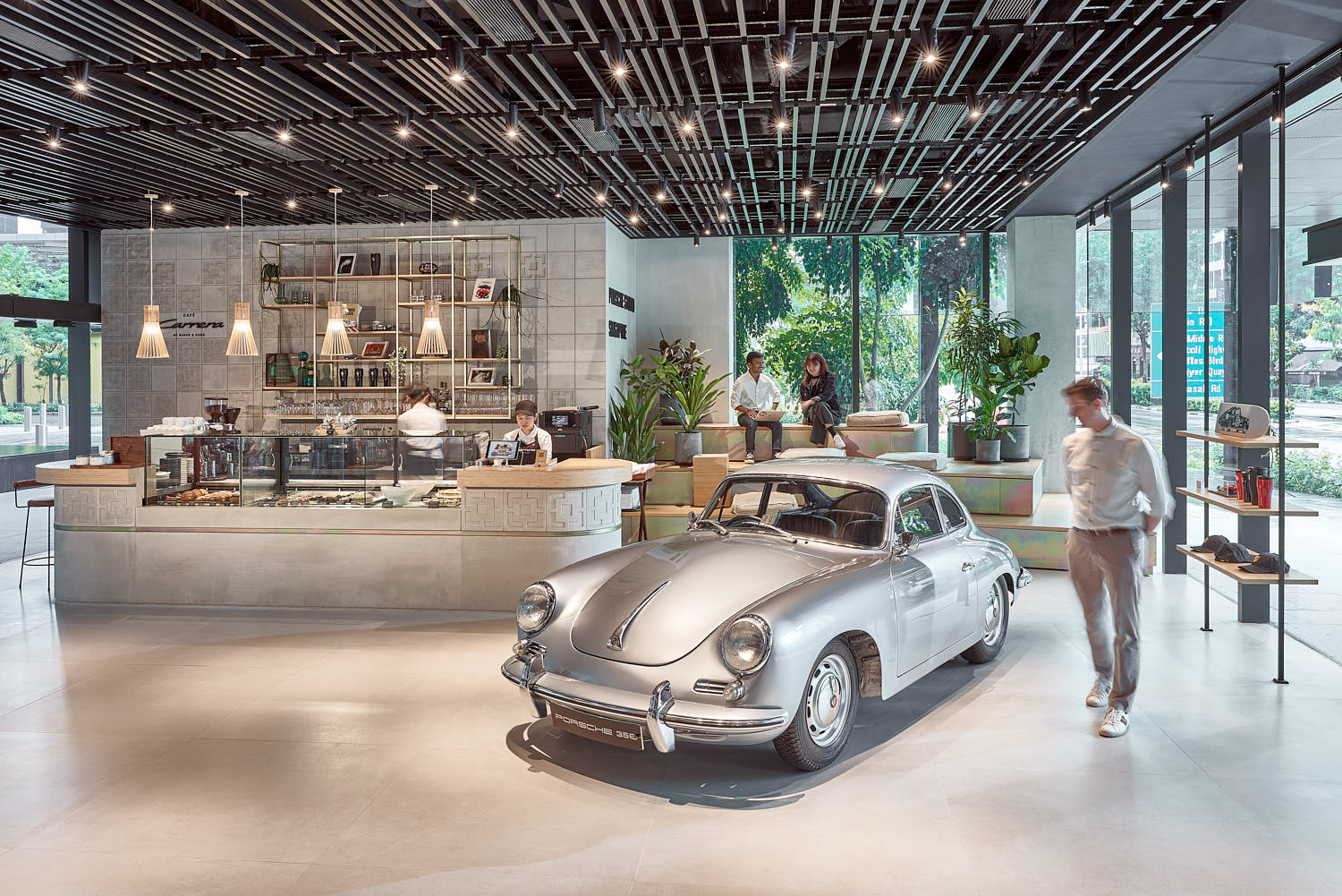 Modern café within the Porsche showroom for customer hospitality.