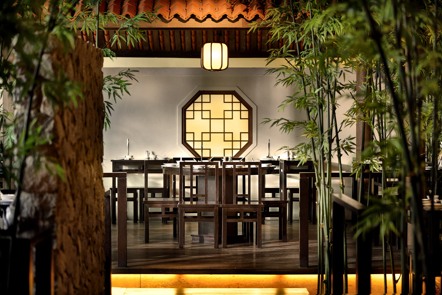 Traditional Chinese ceiling details and vintage fittings inside Soup Restaurant.