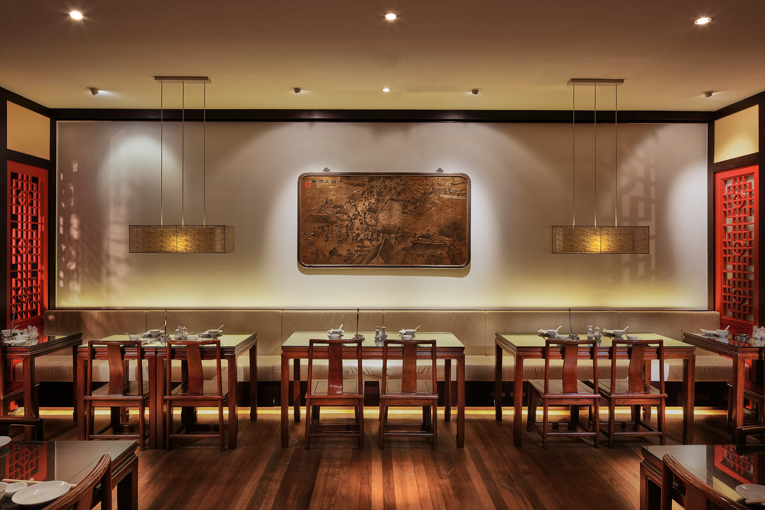 Vintage Chinese-themed wall art and decor in Soup Restaurant interior.